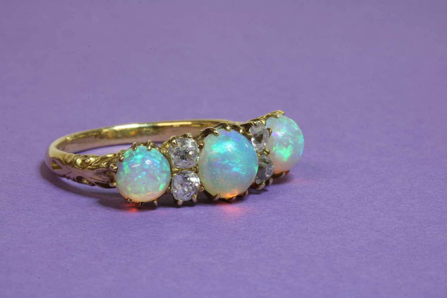 A Victorian seven stone opal and diamond carved head style ring, - Image 4 of 6