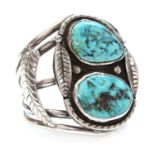 A silver Navajo turquoise set torque bangle or cuff,