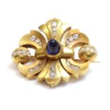 A former Austro-Hungarian sapphire and diamond double fleur-de-lys shaped brooch,