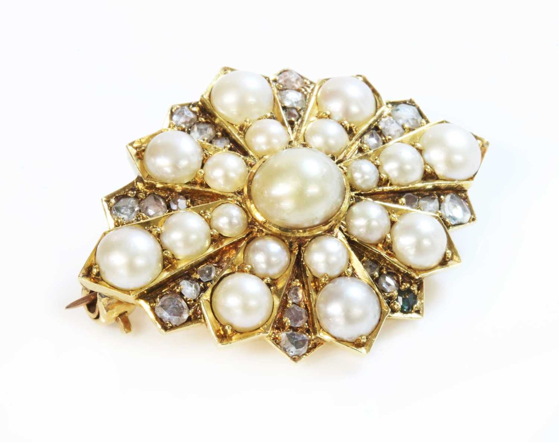 A Victorian gold split pearl and diamond star brooch or motif,