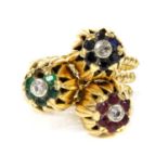 A set of three diamond and gem set stacking rings, c.1950,