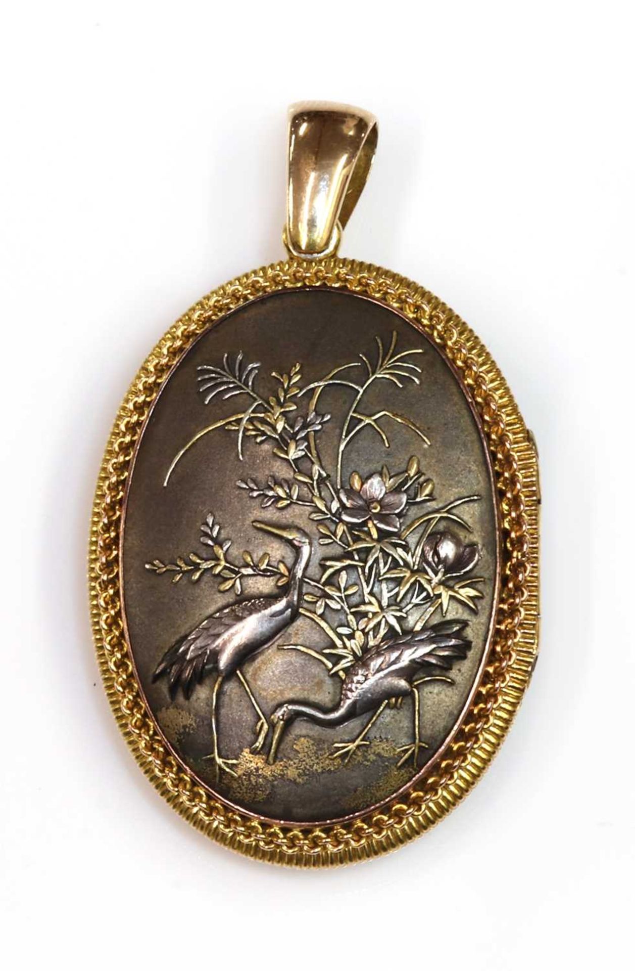 A Shakudo double sided oval hinged locket, c.1880,