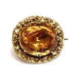 A William IV gold topaz brooch,