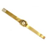 A ladies' 18ct gold Omega mechanical watch movement in an earlier Swiss case and bracelet,