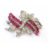 A ruby and diamond double clip brooch, c.1935-1940,