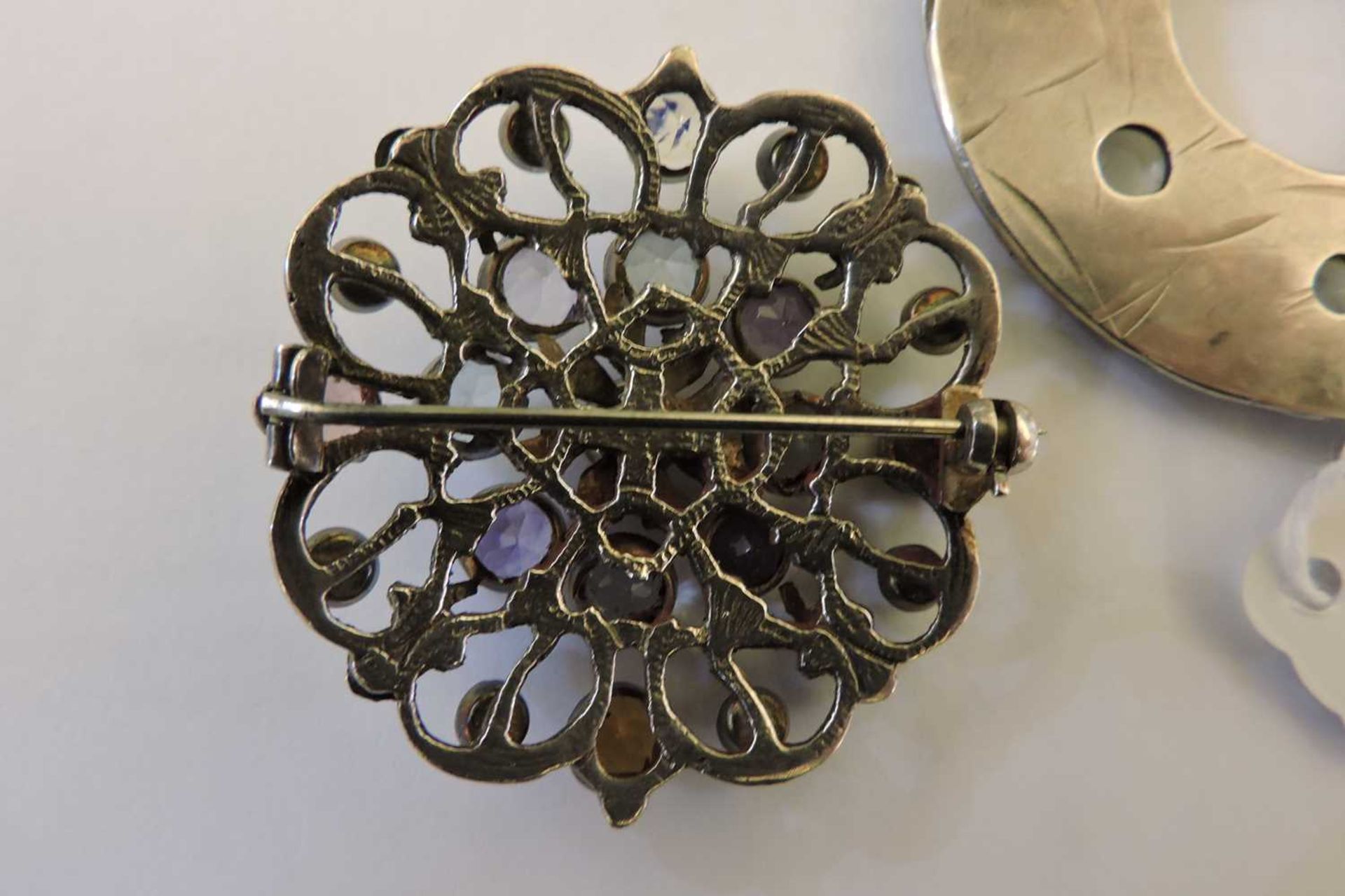 A silver Arts & Crafts moonstone circle brooch, - Image 4 of 6