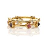 Two gold diamond and gem set stacking rings, by Ilias Lalaounis,