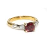 A two colour gold single stone red spinel ring,