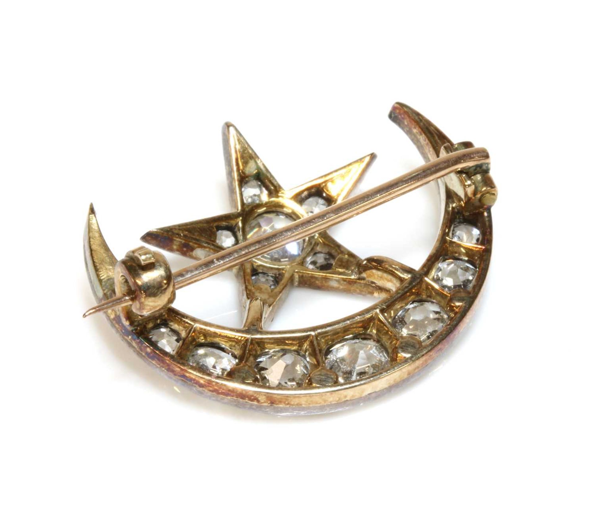 A late Victorian diamond set crescent and star brooch, - Image 2 of 2