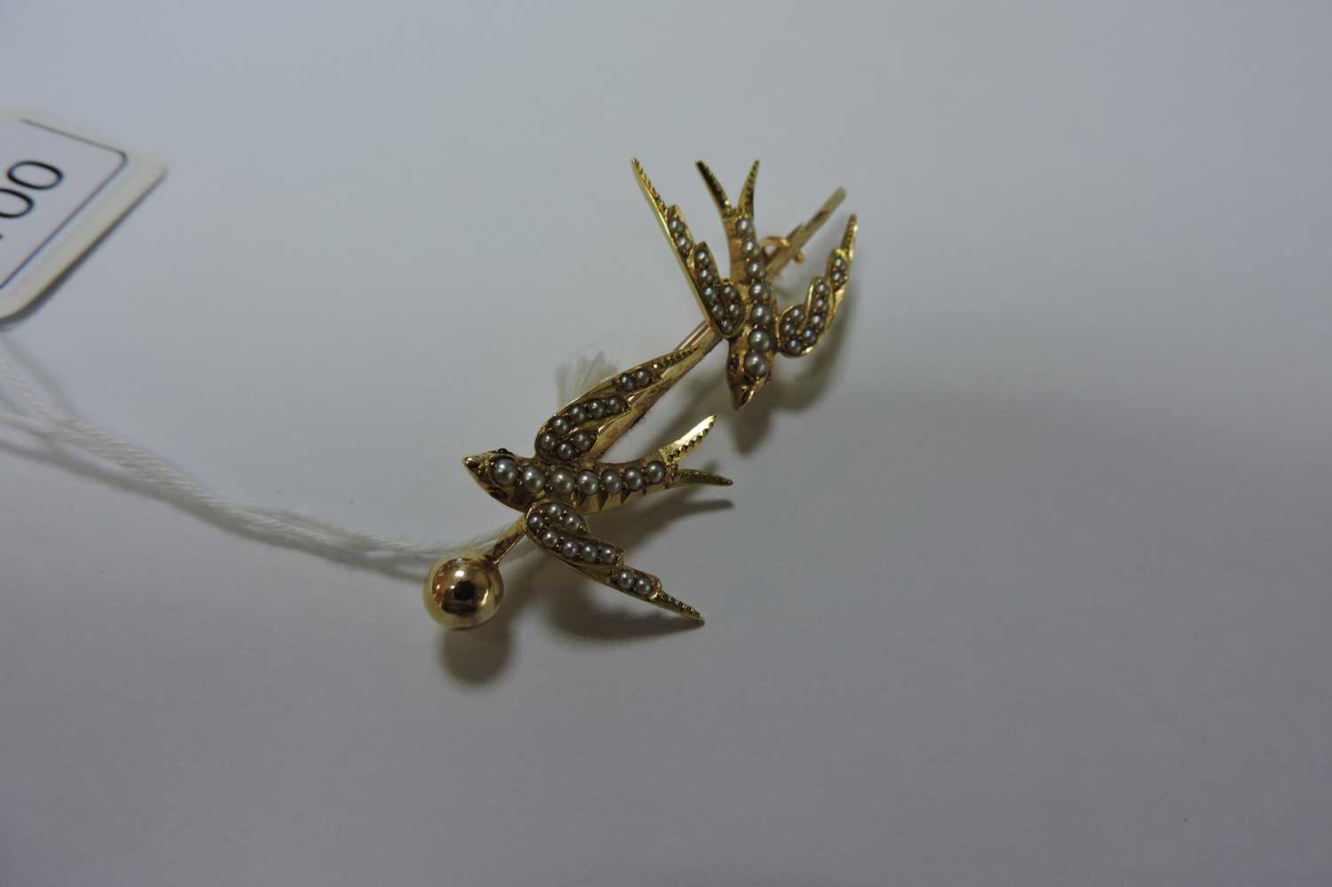 A gold and split pearl swallow brooch, c.1900, - Image 4 of 5