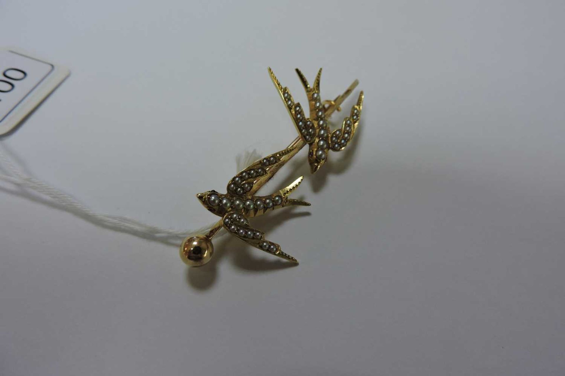 A gold and split pearl swallow brooch, c.1900, - Image 4 of 5