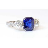 A three stone sapphire and diamond ring,