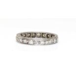 A platinum diamond set full eternity ring,