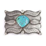 A silver Navajo turquoise set belt buckle, c.1970,