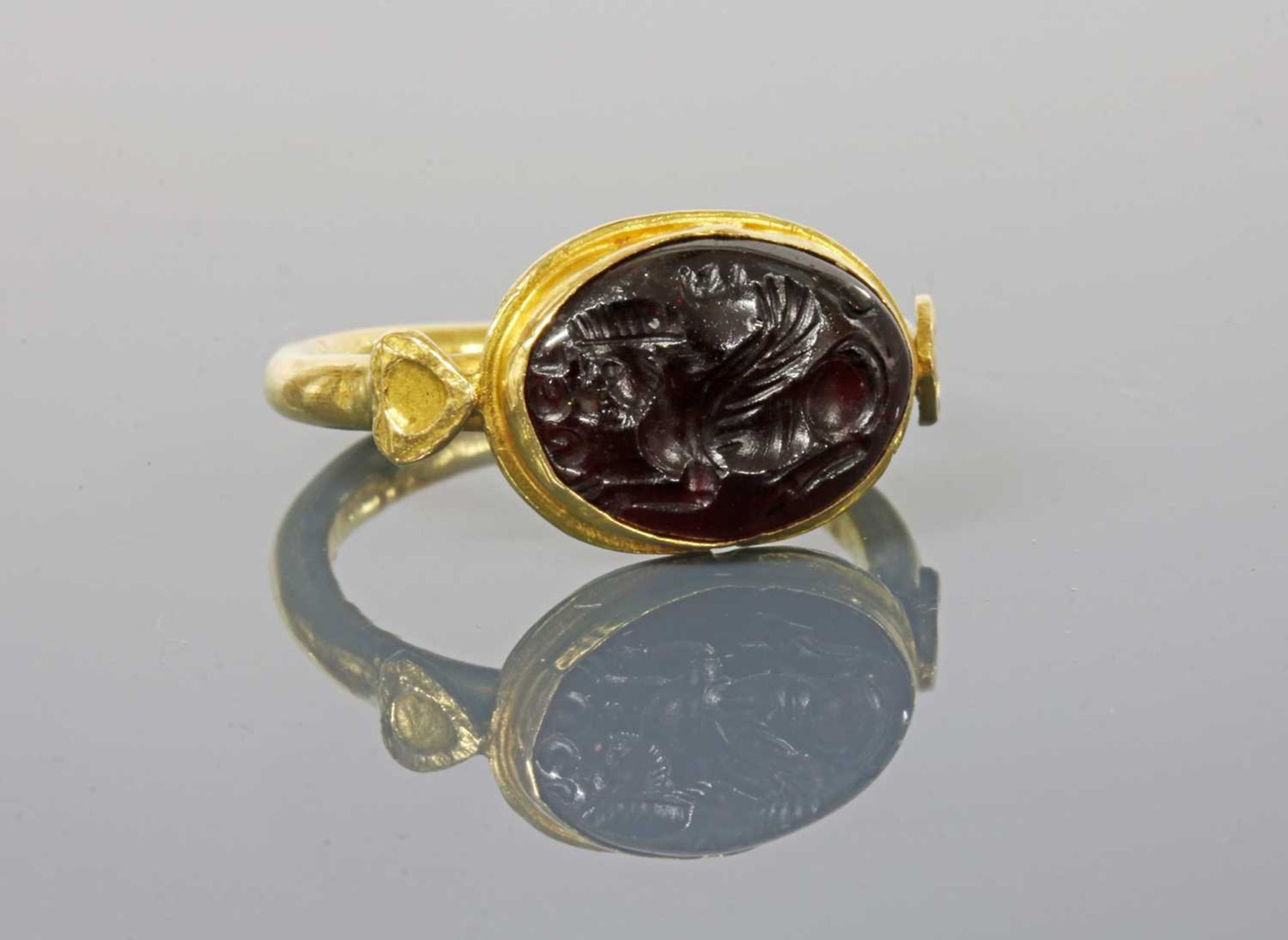 A Byzantine gentlemen's high carat gold cabochon garnet intaglio ring, - Image 3 of 4