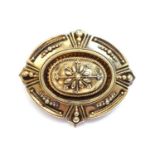 A Victorian archaeological revival Etruscan style shield form brooch, c.1870,