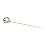 A French Art Deco emerald and diamond stick pin,