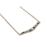 A white gold diamond and sapphire 'V' necklace, c.1970,