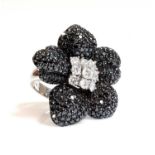 A Continental white and black diamond orchid ring, c.1990,