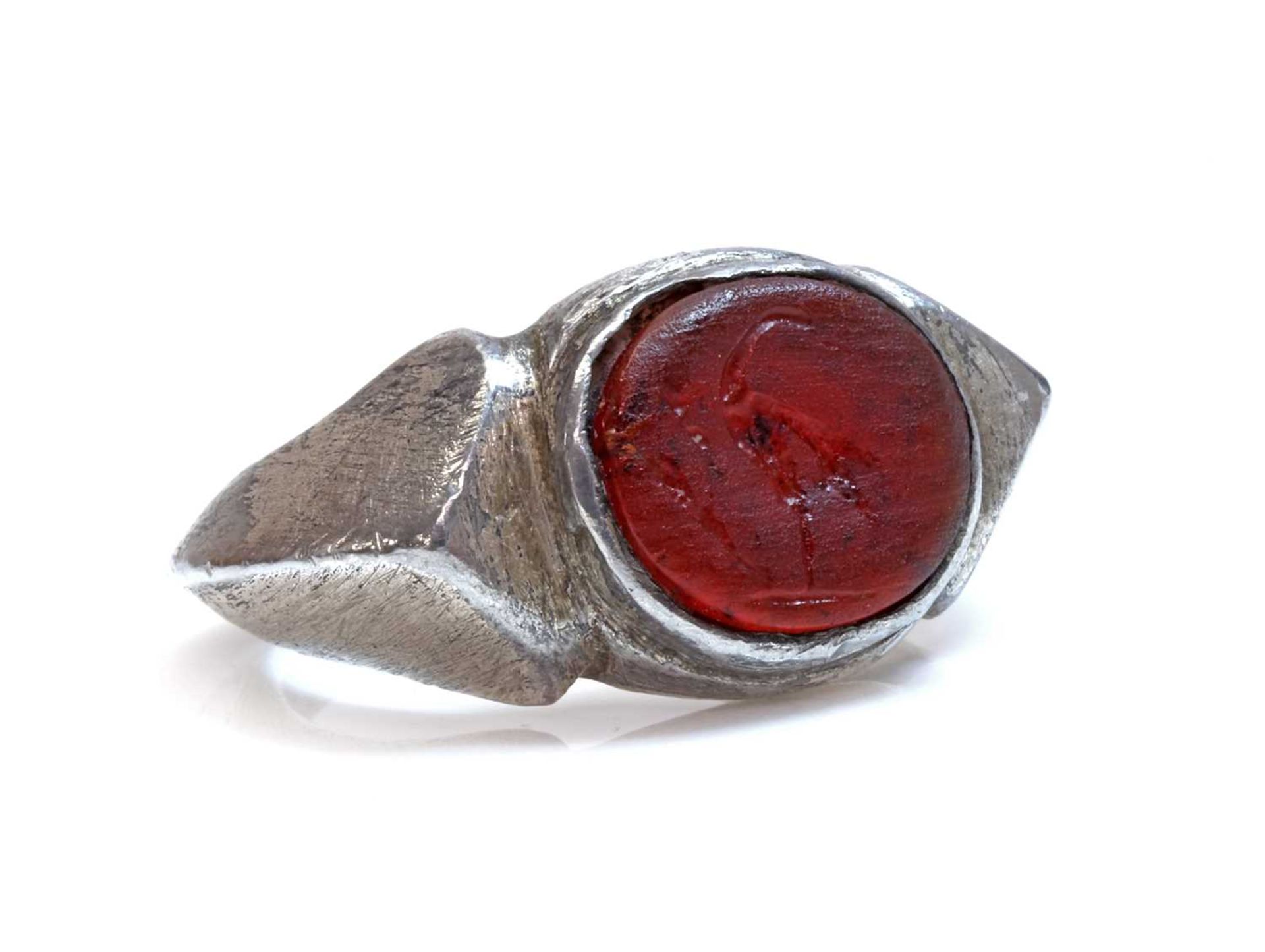 A Roman amber intaglio Legionnaires ring,