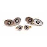 A pair of Hungarian or Austrian diamond, onyx and mother-of-pearl cufflinks,