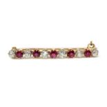 A ruby and diamond two colour bar brooch,