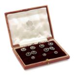 A cased 9ct white gold onyx and split pearl gentlemen's dress set, by S.J. Rose,