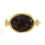 A Byzantine gentlemen's high carat gold cabochon garnet intaglio ring,