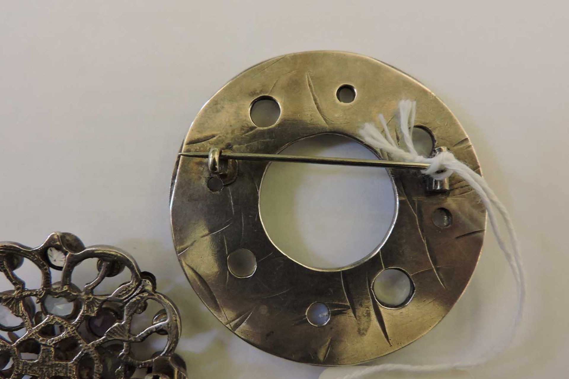 A silver Arts & Crafts moonstone circle brooch, - Image 3 of 6