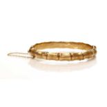 A 9ct gold hollow hinged bangle, by Henry Griffith and Sons,