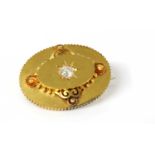A Victorian gold diamond set oval shield form brooch, c.1870,