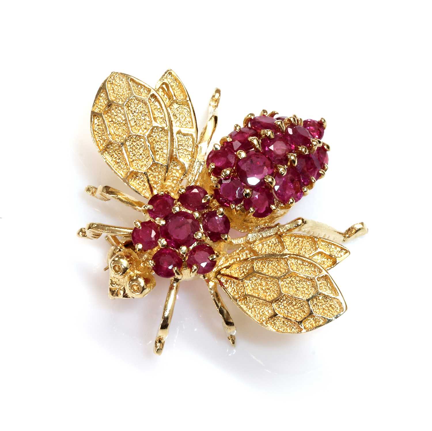 A Continental gold ruby set bee brooch/pendant,