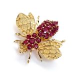 A Continental gold ruby set bee brooch/pendant,