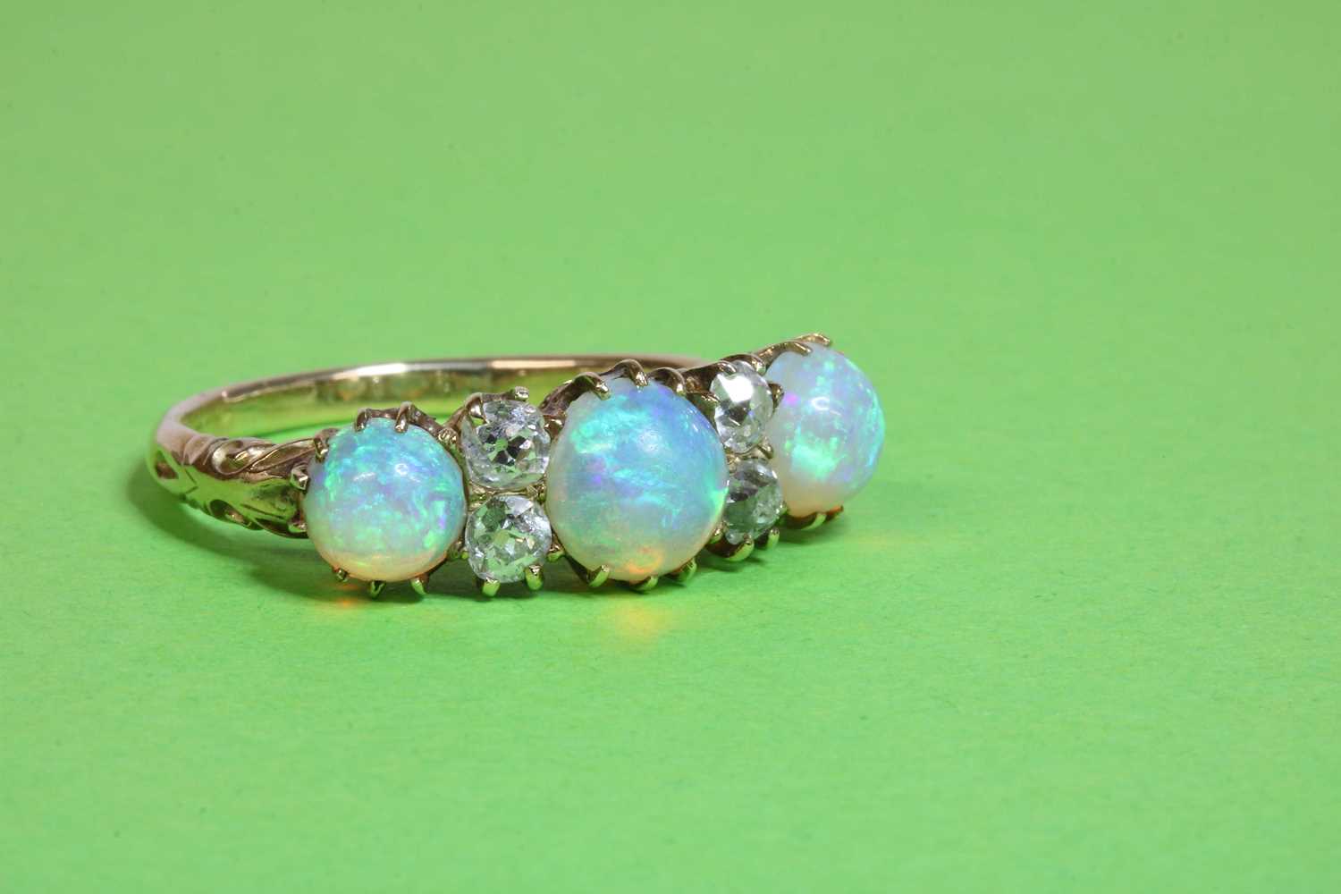 A Victorian seven stone opal and diamond carved head style ring, - Image 3 of 6