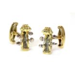 A pair of 18ct yellow and white gold violin scroll cufflinks, by Deakin and Francis, retailed by Ham