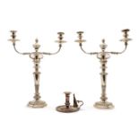 A pair of silver plated twin branch candelabra,