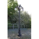 A Victorian-style cast and painted aluminium street lamp,