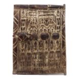 A Drogan carved hardwood granary store or larder door,