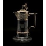 A silver-plated claret jug,