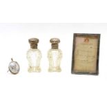Two silver mounted and glass scent bottles,