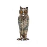 A novelty silver pepperette in the form of an owl,