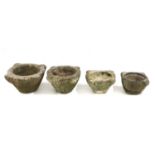 A set of four graduated marble mortars,