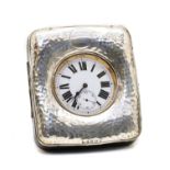 A silver mounted watch case,