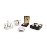 A collection of silver items,