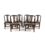 A set of six George III mahogany dining chairs,