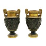 A pair of bronze Grand Tour urns,