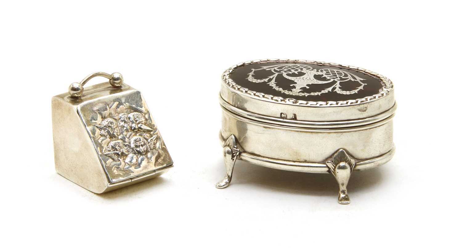 An Edwardian silver dressing table box,