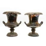 A pair of silver-plated campana shaped urns