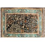 A hand knotted Persian Tabriz design rug,