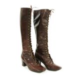 A pair of Yves Saint Laurent heeled knee-high boots,